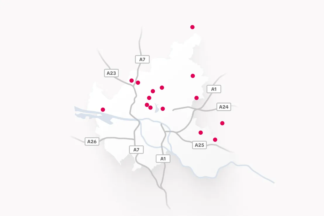 Stilisierte Stadtkarte von Hamburg mit roten Punkten, die verschiedene Standorte markieren.